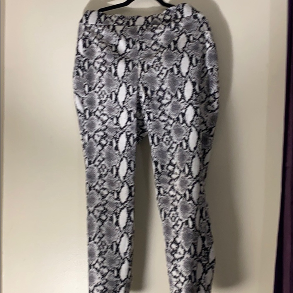 Plus sized snake printed pants light material.